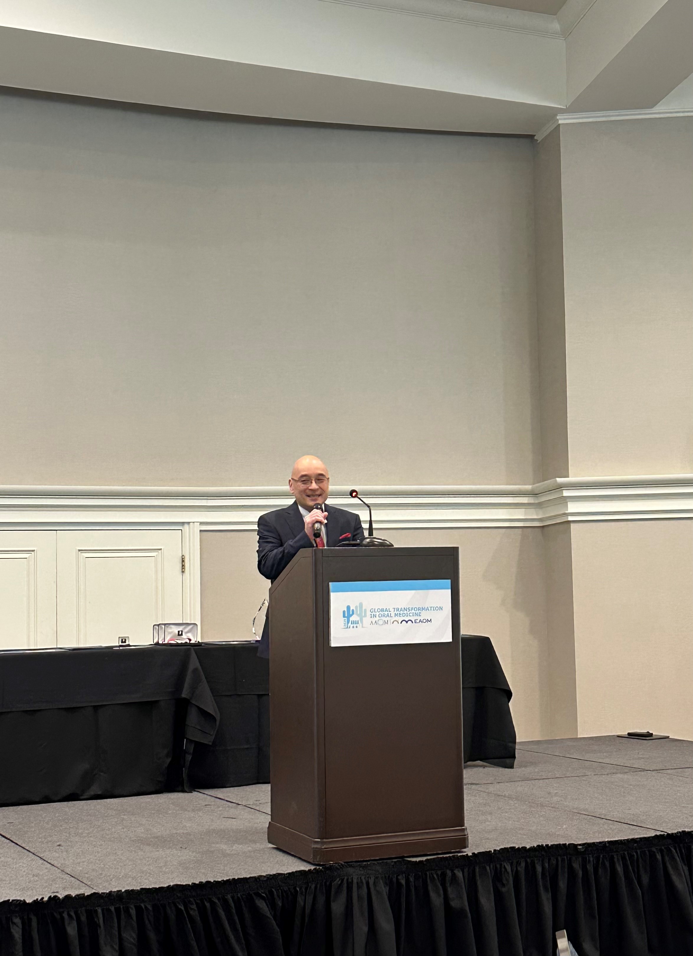 Dr. Kentaro Ikeda, 2024-2025 AAOM President, addressing her farewell speech