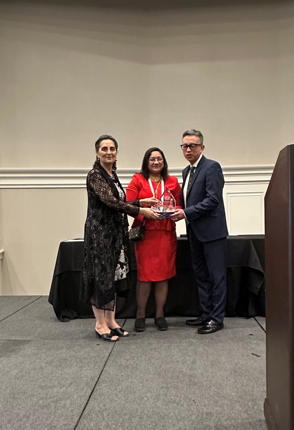 From left to right: Drs. Mahnaz Fatahzadeh, Jaisri Thoppay, and Andres Pinto who is receiving award by the Organization of Teachers of Oral Diagnosis (OTOD) 
